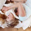 woman hugging a dog